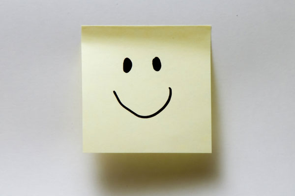 Sticky note with smiley face
